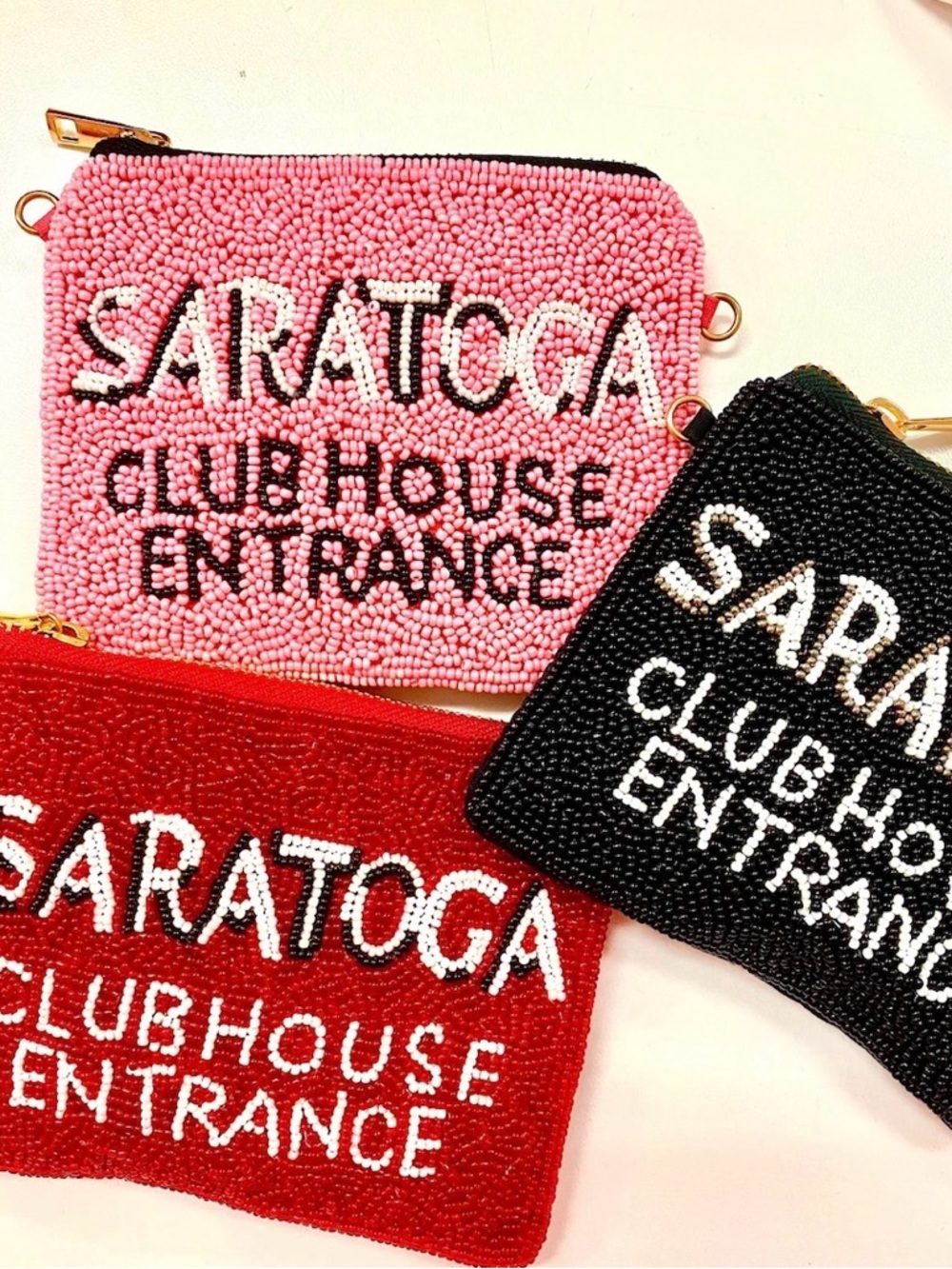 'Saratoga Clubhouse Entrance' Beaded zip pouch with chain in Black